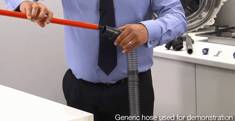 Using a broomhandle to unblock a Hoover hose